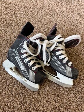 Bauer Black & White Junior Hockey Skates with Red Accents